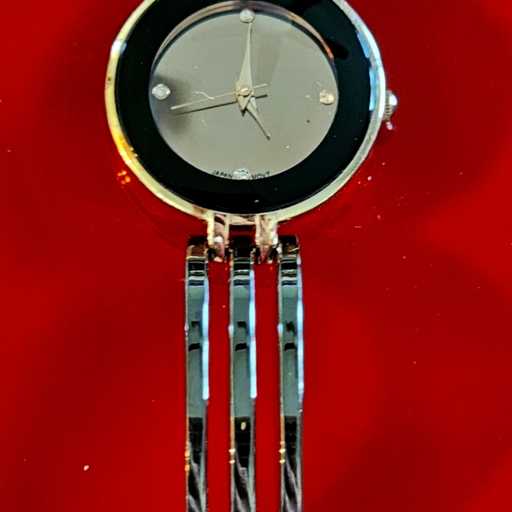 Stylish Black & Rose Gold Ortz Unisex Watch.  Has Rhinestones On Face Of Watch.